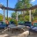 outdoor sitting area under circular trellis